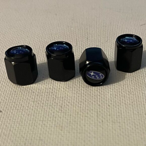 Subaru logo valve Stem caps in black set of 4 NWT - Picture 2 of 4